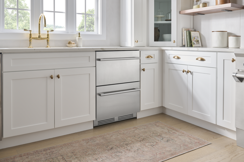 White kitchen featuring refrigerator drawers