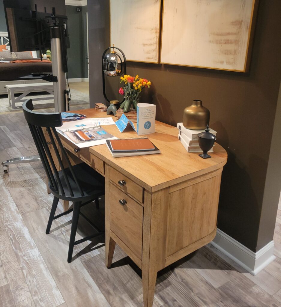 Curved wooden desk in a furniture showroom