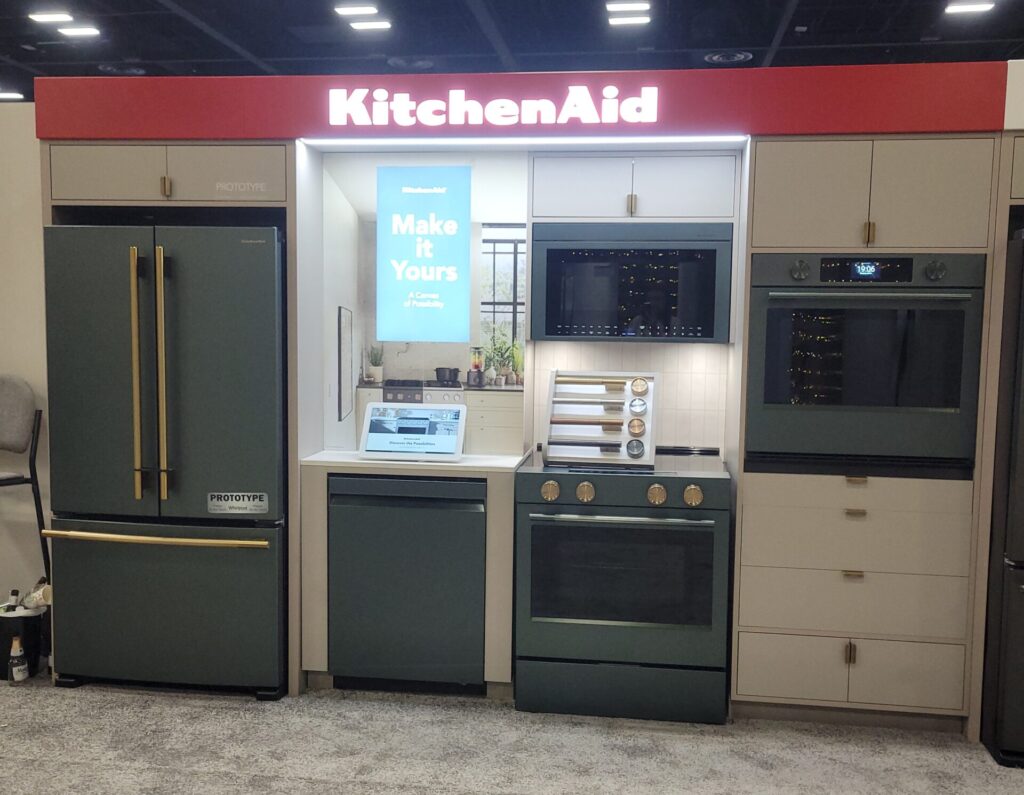 Green KitchenAid appliances at an expo